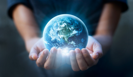 View Champions of Cell and Gene Therapy: How do we ensure that not only the rich will benefit from cell and gene therapy? man holding globe in his hands
